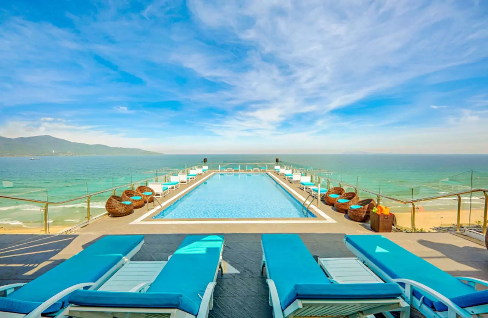 Rooftop pool at Yarra Ocean Suites Danang with panoramic ocean views.